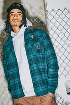 Men's Builders Bowery Stretch Water Resistant Flannel in the color Night Sage/Black - Men's Lifestyle image