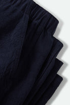 Women's Utility Everyday Barrel Pant in the color Washed Navy - Additional Laydown image