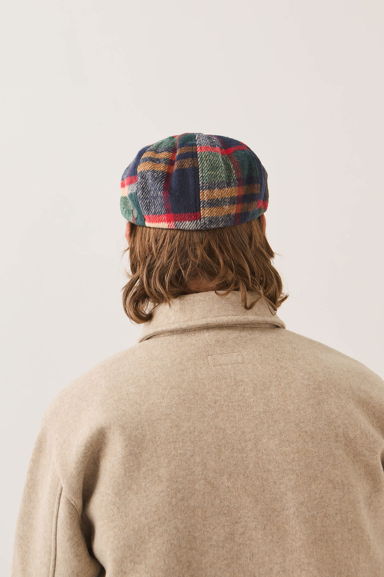 Unisex Brood Newsboy Cap in the color Navy/Green/Red/Cream - Men's Back View