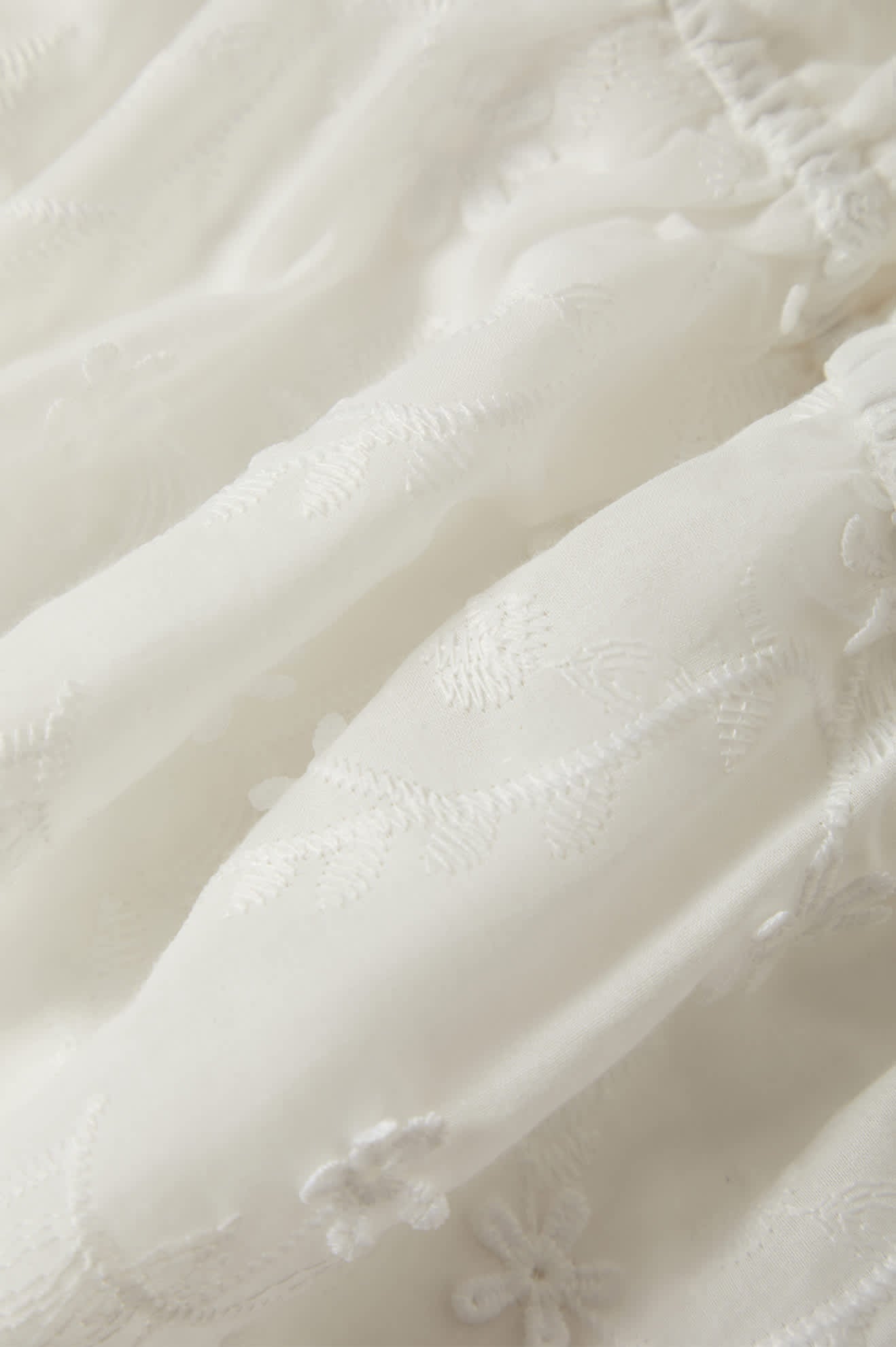 Women's The Abigail Tie Top in the color Off White Floral - Additional Laydown image